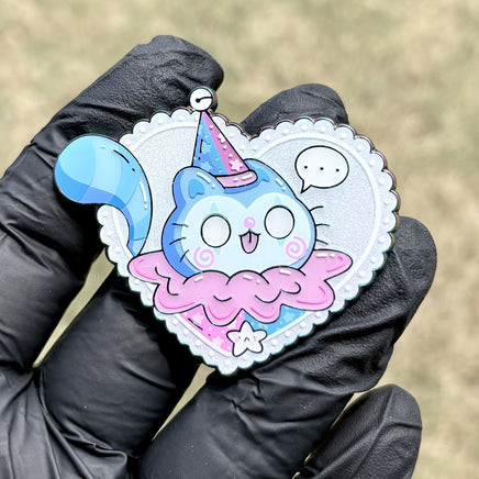 Bluebell (Light Background) enamel pin by Bexii_Draws - heart-shaped soft enamel pin with glitter effects and light background featuring a cute blue cat character